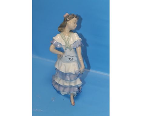 A NAO FIGURE OF A GIRL DANCER