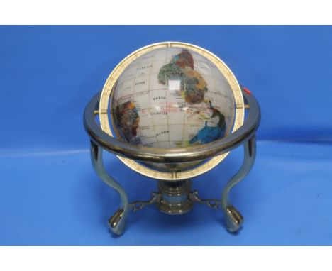 A TERRESTRIAL GLOBE IN BRASS MOUNT