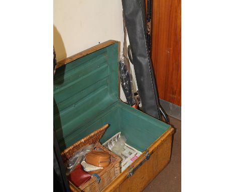 A QUANTITY OF ASSORTED FISHING TACKLE TO INCLUDE RODS, REELS ETC. CONTAINED IN A LARGE TIN TRUNK