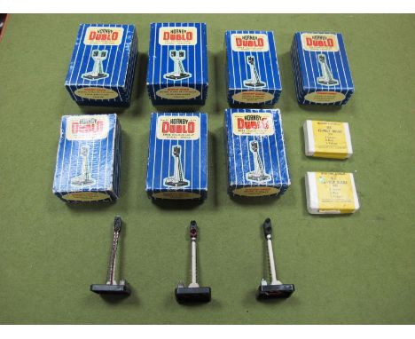 A Quantity of Hornby Dublo Colour Light Signals, including 5045/656/657, seven boxed. Plus two boxed Hornby Dublo spare bulb 