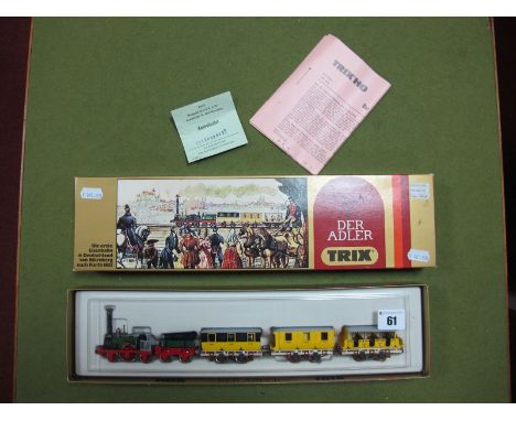 An 'HO' Scale Der Adler' with Coaches by Trix, boxed, with instructions.