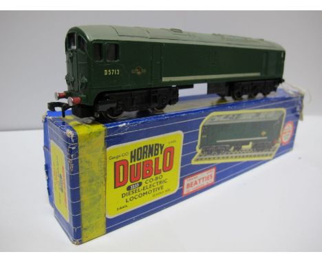 A Hornby Dublo No. 3233 Three Rail Co-Bo  Diesel Electric Locomotive, R/No. DS713, overall very good. Boxed Some tape to box.