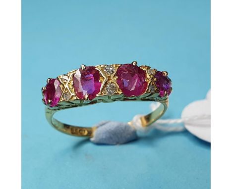 An 18ct ruby and diamond ring, approx. ring size O½Stone secure in setting, light wear to mount, no noticeable  chips to ston