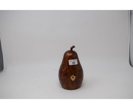 A painted tea caddy, in the form of a pear, 17.5 cm highReport by RBModern Report JS - some surface scratches 