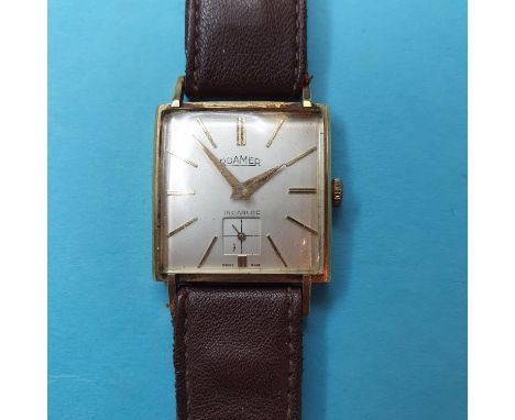 A gentleman's 14ct gold Roamer wristwatch, inscribedBack engraved , light wear to case , dial with slight discoloration.We ha