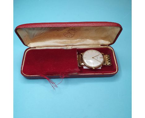 A gentleman's 9ct gold Marvin wristwatch, with baton indices, on a 9ct gold link strap, approx. 50.0 g (all in), boxedOverall