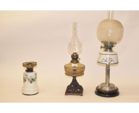 An Art Deco silver plated oil lamp, with white glass well, and five others (6)No damage found to fonts,  lamps not complete, 