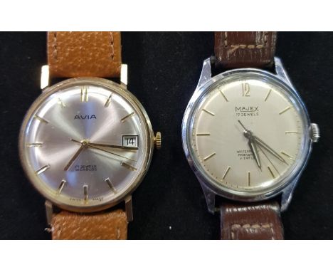 An Avia gentleman's 9ct gold wristwatch, and a Majex silver plated gentleman's wristwatch, both with later leather strapsGold