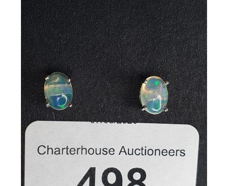 A pair of black Ethiopian opal and silver stud earrings 