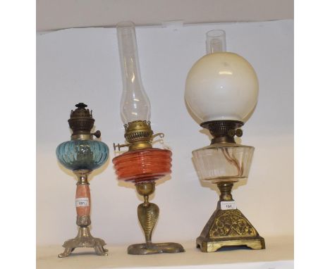 A late 19th/early 20th century glass and glass oil lamp, and nine others (10) 