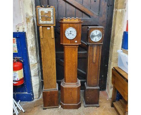 A dwarf longcase clock, and two others (3) 