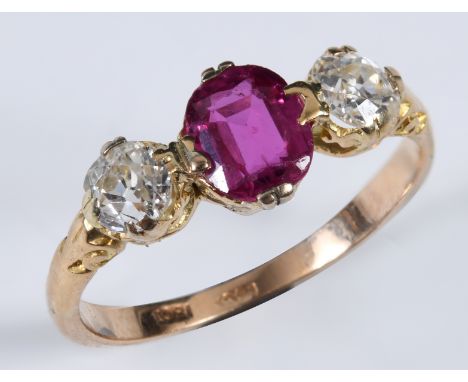 An 18ct gold, ruby and diamond three stone ring, approx. ring size Q½ 