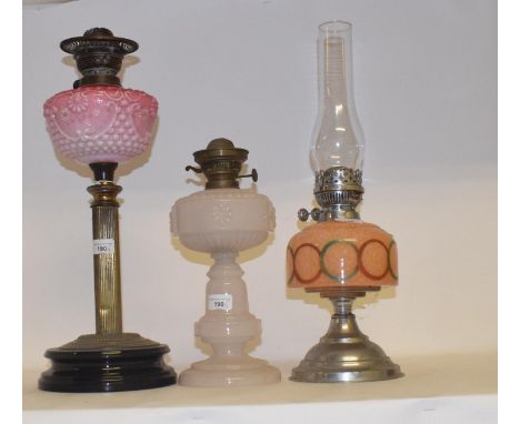 A late 19th/early 20th century brass oil lamp, with clear glass well and eight others (9)Oil lamp with pierced brass base, la