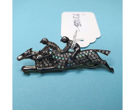 A 9ct gold, silver, diamond and opal jockey brooch 