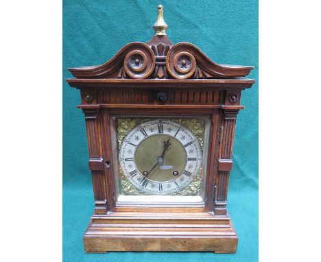 WALNUT CASED BRACKET CLOCK WITH ORMOLU MOUNTED BRASS DIAL