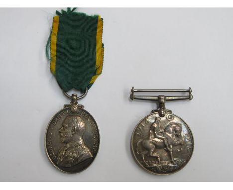 GEORGE V TERRITORIAL FORCE EFFICIENCY MEDAL TO 910094 SGT A BS MJR G E LANGLEY ROYAL ARTILLERY.  ALSO MATCHING FIRST WAR MEDA