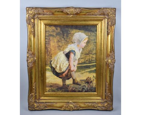 A Modern Gilt Framed Print of Child Pulling Up Stockings, 29x39cms 