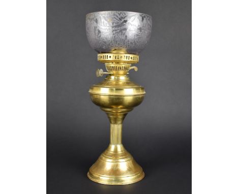 A Mid 20th Century Brass Oil Lamp with Glass Bowl Shade, 41cms High 