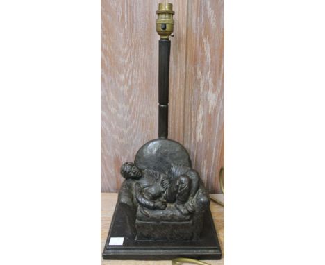 A bronzed table lamp, the base being a boy &amp; his dog in an easy chair&nbsp;&nbsp;