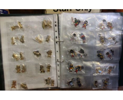 A collection of 75 Robertson's "Golly" collectors badges, in green file / These items are listed on the basis they are illust