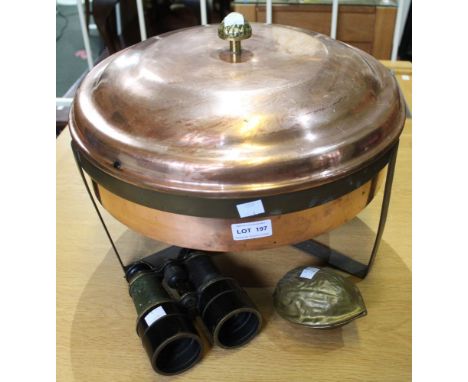 A lidded copper pan on metal stand, 39.5cm diameter, a pair of binoculars and a cast brass nut form nut-cracker (3)