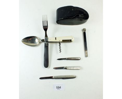 An early 20th century folding travellers/campaign cutlery folding tool together with three small folding knives and a Stanhop
