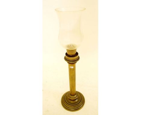 A brass candle lamp - 56.5cm tall