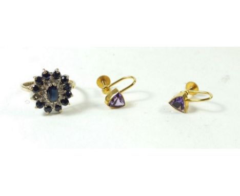 A pair of 9ct gold amethyst earrings and a 9ct gold sapphire cluster ring, one stone deficient