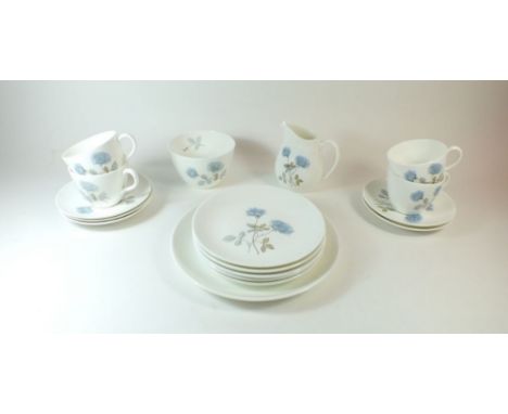 A Wedgwood 'Ice Rose' part tea service comprising: cup and saucer, milk, sugar, five tea plates and cake plate