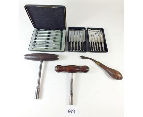 Two vintage piano tuning keys, a Moore and Wright set of precision screwdrivers, another set cased and a goldsmiths engraving