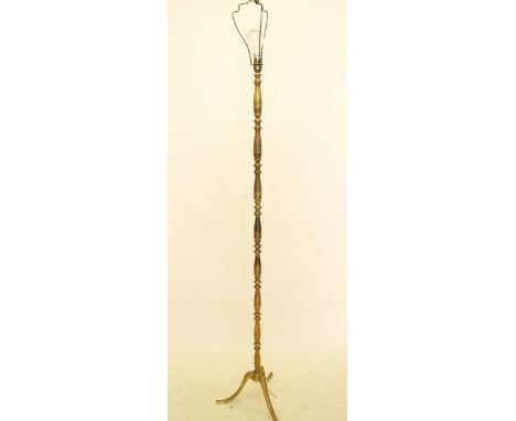 A brass turned standard lamp