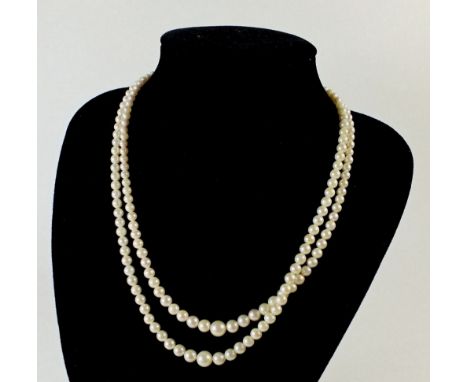 A double row pearl necklace with silver marcasite clasp