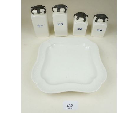 Four Ridgeways white pottery military numbered medical jars with arrow mark and metal bound tops plus a square white dish