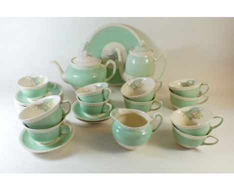 A Grays 1930's tea service decorated Lily of the Valley, comprising: teapot, coffee pot, six breakfast cups, five tea cups an