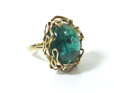 An unusual modernist 18 ct gold ring set green tourmaline (unmarked but tested gold) size O/P