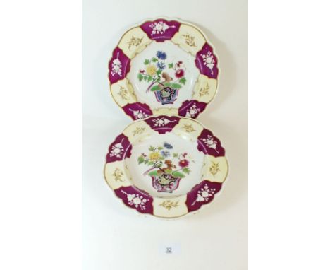 A pair of early 19th century Chamberlains Worcester Chinoiserie porcelain plates painted in cream and burgundy, 26cm diameter