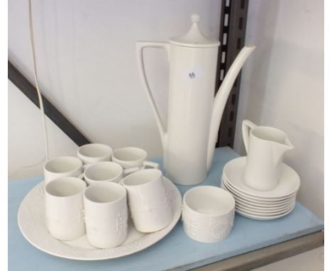 A white Portmeirion matched coffee set comprising: seven Totem cups and eights saucers, cake plate and sugar bowl with plain 