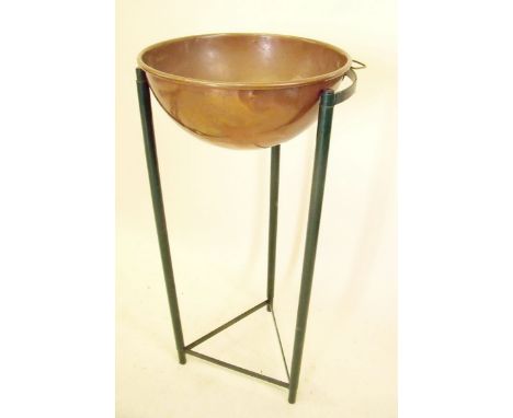 An army copper campaign wash basin with military arrow mark, 14" 1955 by L &amp; W on green painted metal stand