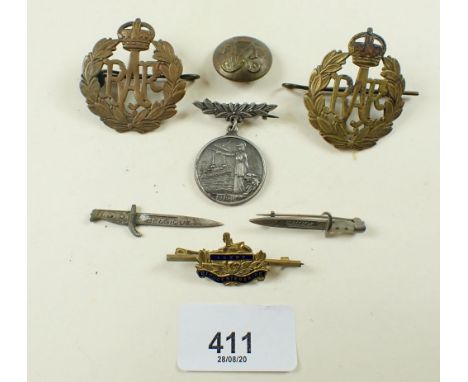 A WWI peace medallion, a similar period Gloucestershire regiment enamel sweetheart badge, two WW2 RAF cap badges, a Victorian