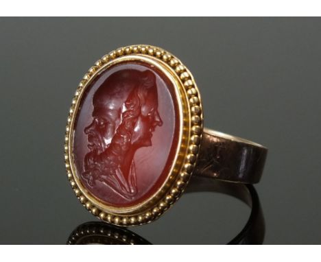 A Georgian gold gentleman's seal ring carved cornelian double faced illusion cameo - unmarked, 7.4g, size P