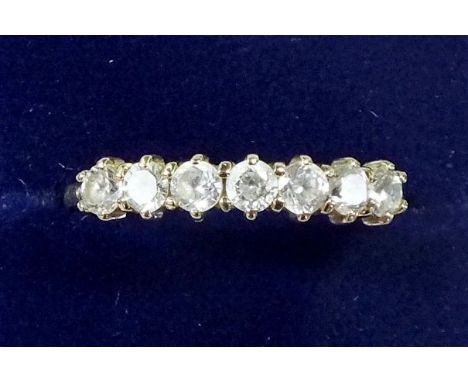 A 9 carat gold ring set seven white stones - size N 1/2