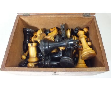 A Staunton style boxwood and ebony chess set - boxed and complete