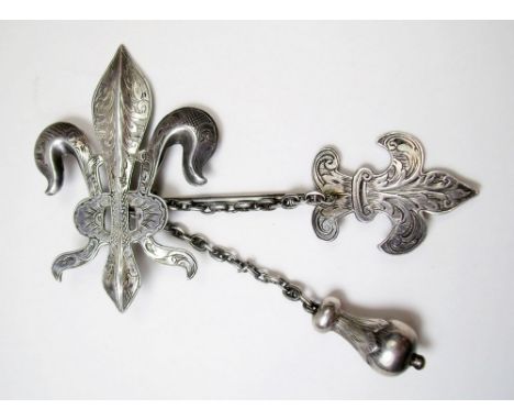 An Exeter large silver cloak pin of trefoil design with engraved decoration by Henry S Ellis, 9cm x 5.5cm