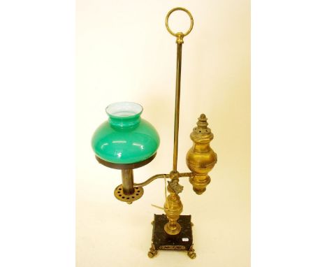 A Victorian brass adjustable oil lamp with green glass shade, 59cm