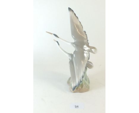 A Nao porcelain figure of flying herons, 27cm