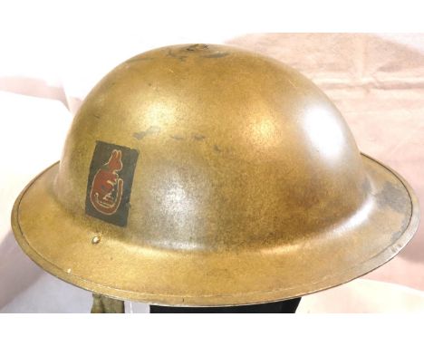WWII British 8th Army Helmet. Some rust damage and broken strap. P&amp;P Group 2 (£18+VAT for the first lot and £3+VAT for su