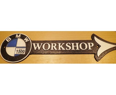 Cast iron BMW Workshop arrow sign, L: 46 cm. P&amp;P Group 1 (£14+VAT for the first lot and £1+VAT for subsequent lots) 