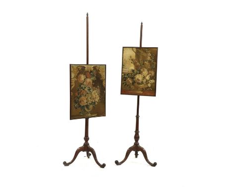 A near pair of George III mahogany pole screens, with tapestry panels on scrolled, tripod bases, 157cm highCondition report: 