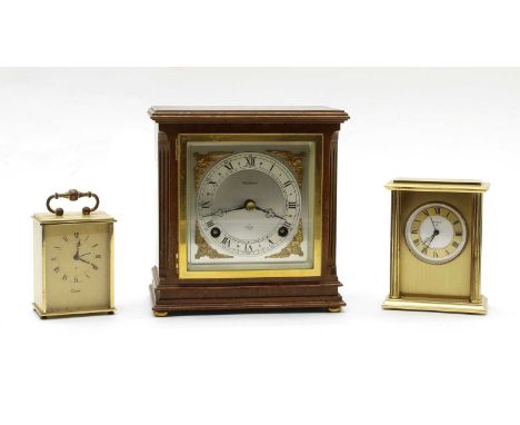 Three mantel clocks, the first by Elliott, with dial inscribed 'W H Peplow'' striking the half hours on a bell, in a wooden c