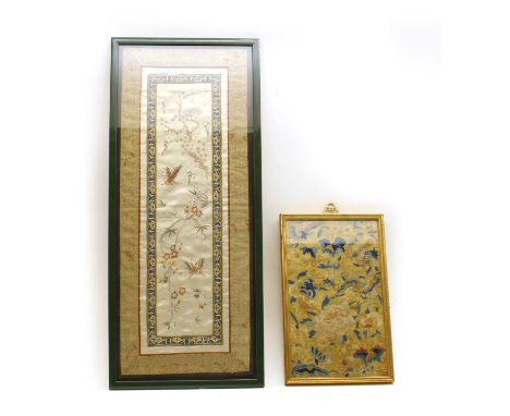 2 framed Oriental needlework panels, the first a Chinese skirt panel, 31 x 18.5cm, the second Japanese. 62.5 x 26cmCondition 